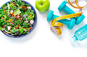 istock Healthy eating and exercising. Copy space on white background 1375039147