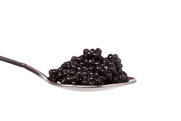 istock black caviar in spoon on white background 137503979