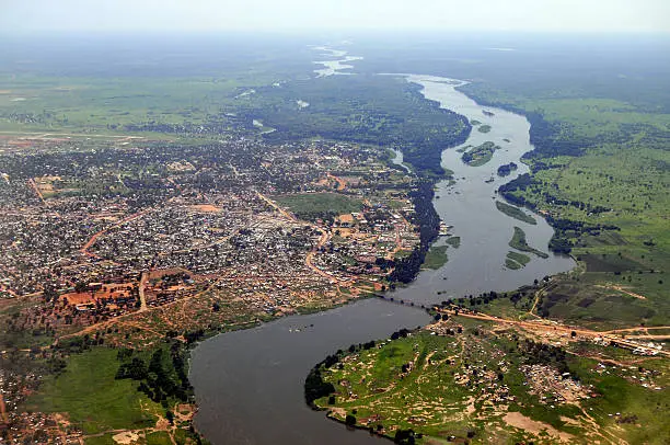 Aerial of Juba, the capital of South Sudan, with the river Nile running in the middle. Juba downtown is upper middle close to the river, and the airport can be seen upper left. The picture is from the south to the north.