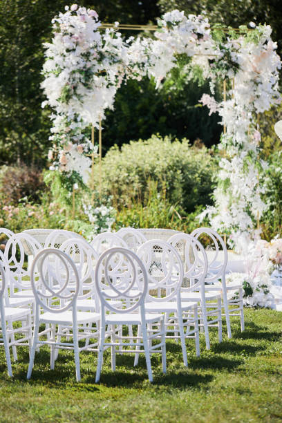 Place for wedding registration decorated with natural flowers place for wedding registration decorated with natural flowers. country wedding arches stock pictures, royalty-free photos & images
