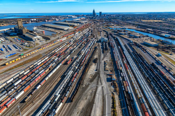 The city of Mobile, Alabama beyond the city's rail yards containing numerous freight cars shot from an altitude of about 800 feet during a helicopter photo flight