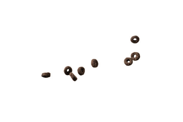 istock Chocolate rings cereal spill out into a bowl. Breakfast. 1375135977