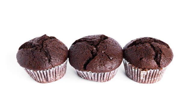 istock Chocolate cupcakes with cherry jam isolated on a white background. Chocolate muffin 1375161846