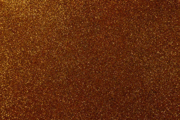beautiful festive shiny with shimmering brown sequins. brown glitter stock photo