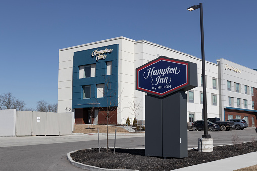 Walton - Circa February 2022: Hampton by Hilton property. Hampton Inn is part of the Hilton Worldwide family of hotels, resorts and residential lodging locations.