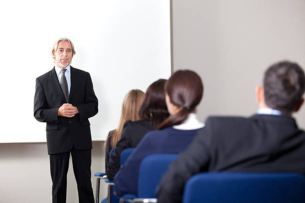 istock Mature businessman giving business training 137517843