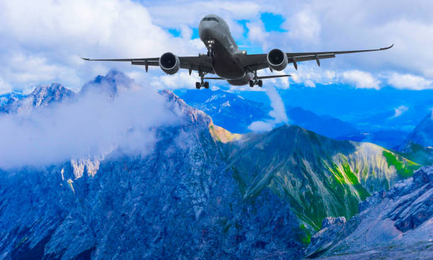 istock Plane flying over Mountains of Alps 1375180630