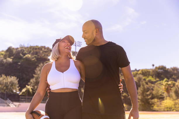 Beautiful black couple exercising outdoors
