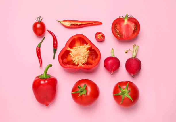 istock Flat lay composition with fresh vegetables on pink background 1375195862