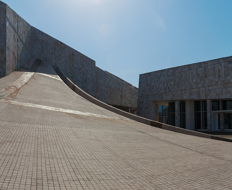 2018 June 23. Spain. Santiago de Compostela. City of Culture of Galicia - Cidade da Cultura de Galicia, оne of the most interesting buildings in Galicia and Spain, built like an extension of a hill and which, alas, will not be completed due to cost overruns. There are interesting exhibitions and cultural events here, and very few people on weekdays. If you ever happen to visit Santiago de Compostela, visit this complex, it is an unforgettable experience.