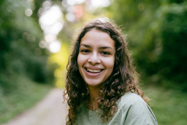 istock Smiling woman in the natural park 1375207618