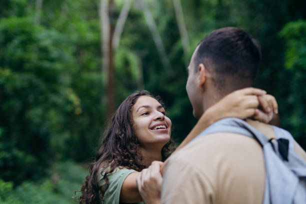 istock Couple hugging in nature park 1375208169