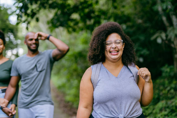 istock Plus size woman walking in the natural park 1375210422