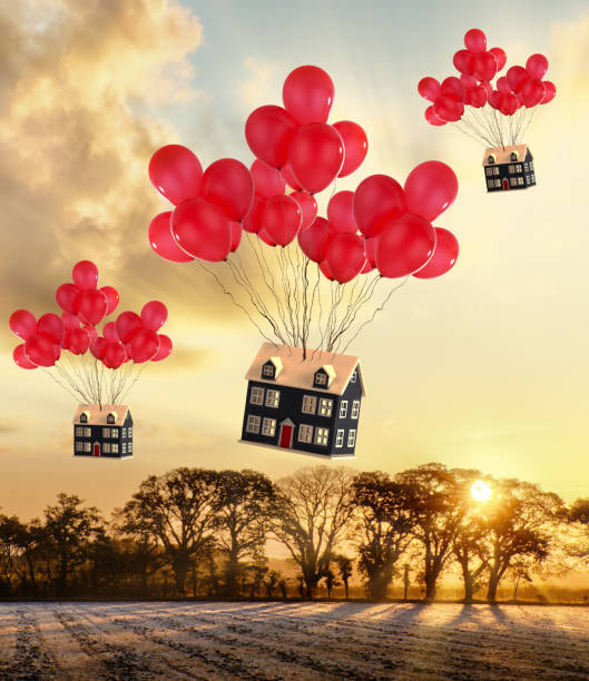 Moving to the country with balloons concept stock photo