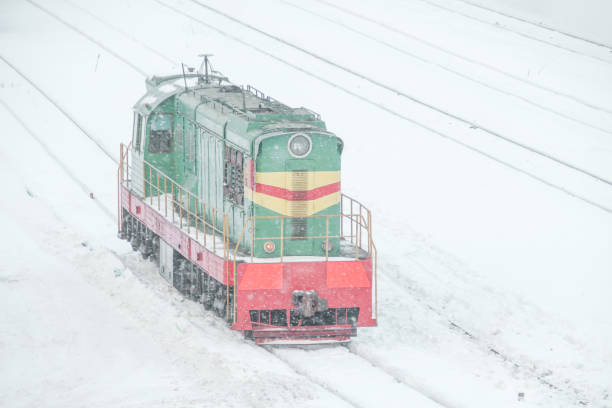 shunting diesel locomotive on railway tracks stock photo