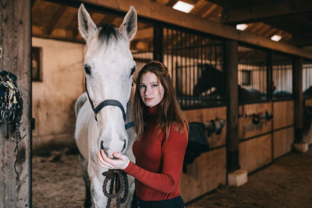 istock Woman with horse 1375226767