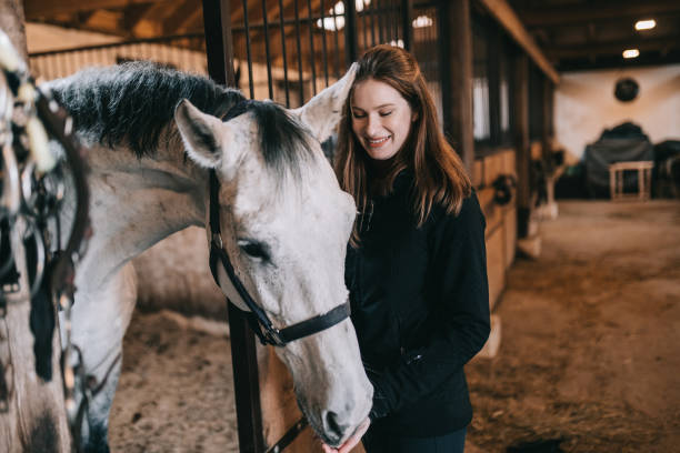 istock Woman with horse 1375226768
