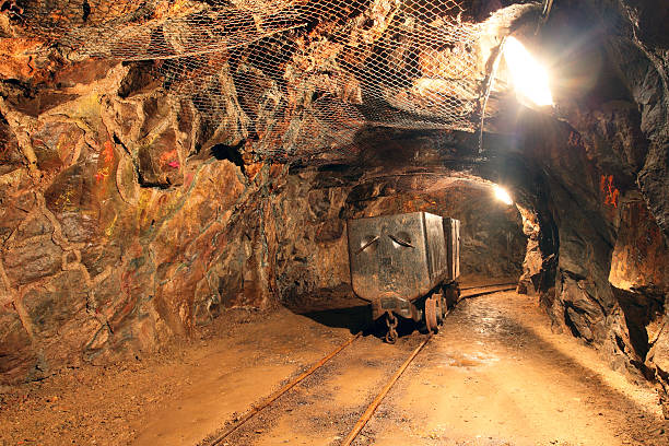 istock Gold silver and copper mining tunnel with machinery 137523248