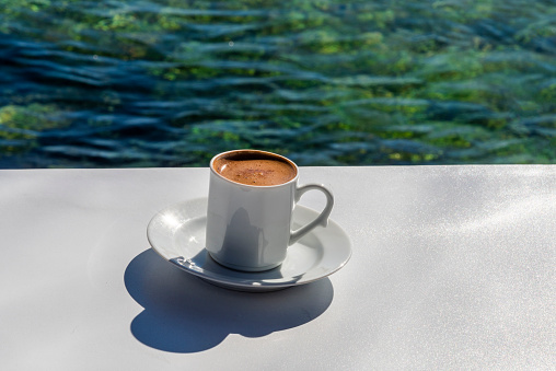 Turkish coffee cup, sea background