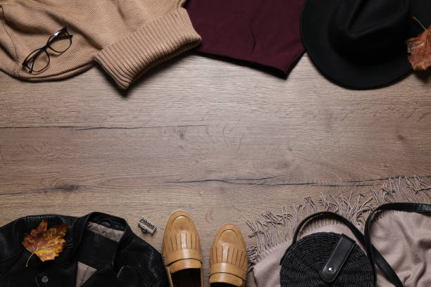 istock Flat lay composition with stylish clothes and accessories on wooden background, space for text 1375237588