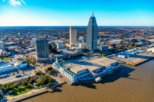 Downtown Mobile Alabama Downtown Mobile, Alabama and surrounding area shot from an altitude of about 600 feet during a helicopter photo flight alabama stock pictures, royalty-free photos & images