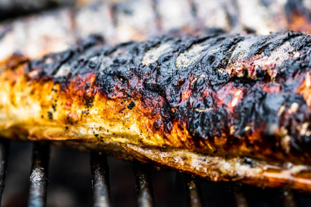 Grilled fish on charcoal grill. Fresh fish barbecue