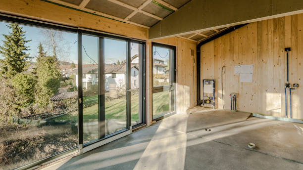 istock Wooden building interior, sun shinning through big windows 1375256451