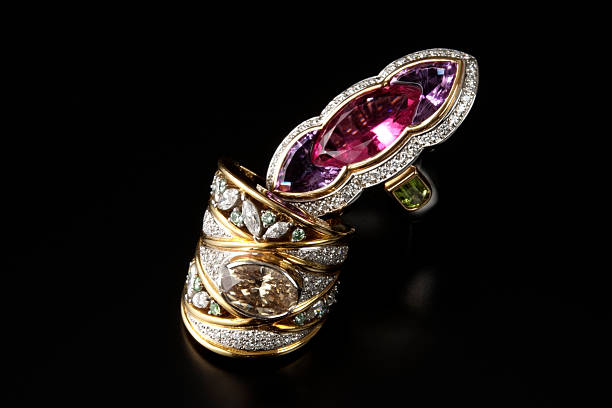 istock Stacked two luxury Jewelry rings on black background 137525702