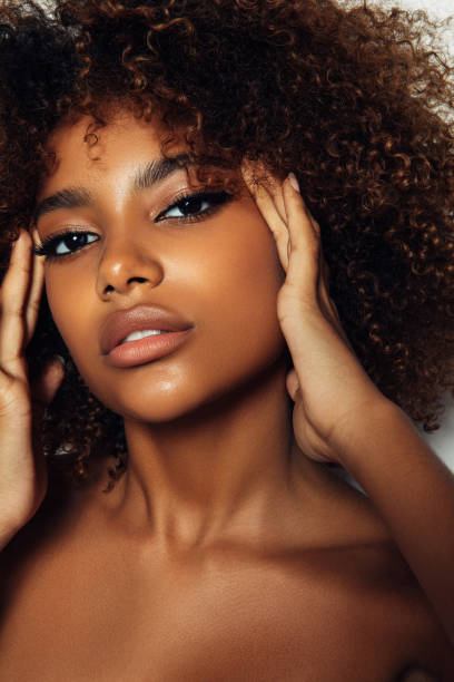 istock Beautiful afro girl with curly hairstyle 1375264548