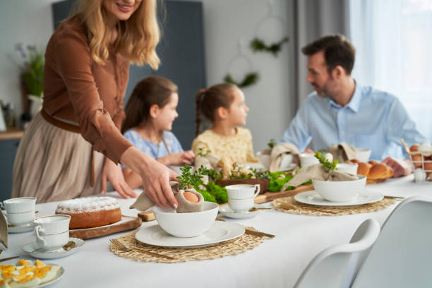 istock Caucasian family about to start an easter dinner at home 1375264682