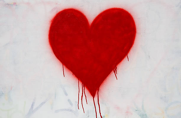 red bleeding heart spray painted stock photo