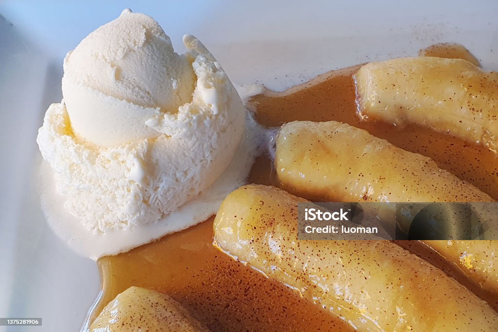 Banana flambee with vanilla ice cream Banana sprinkled with cinnamon Banana Stock Photo