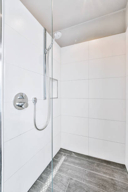 istock A delightful shower cabin with a dark tiled floor 1375296619