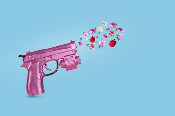 istock Pink Gun shooting beautiful flowers. 1375301904