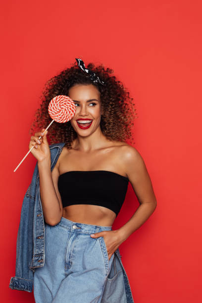 istock Beautiful woman with perfect curly hairs 1375302065