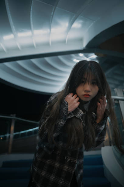 Asian young women on the bridge at night