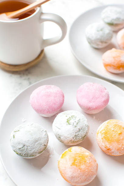 istock Mochi ice cream with green tea on the table 1375357788