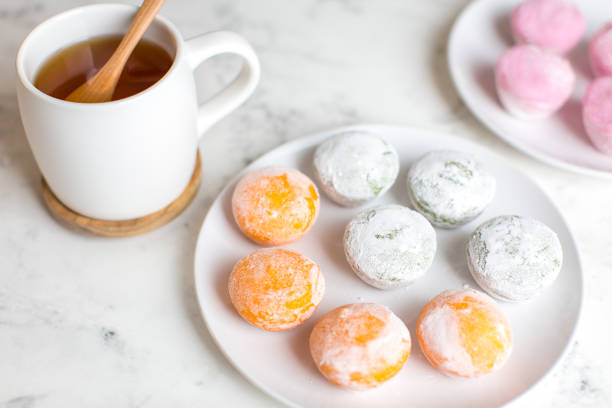 istock Mochi ice cream with green tea on the table 1375357789