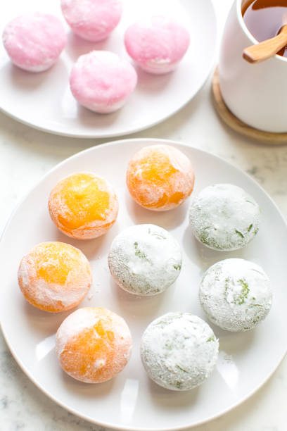 istock Mochi ice cream with green tea on the table 1375357801