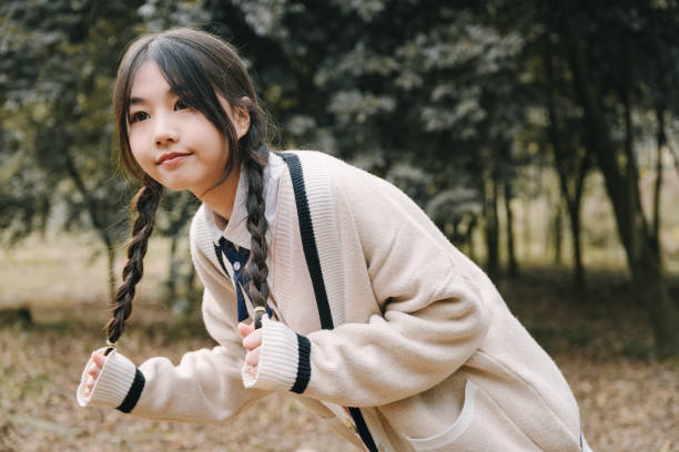 istock Asian girls in the sun 1375374534