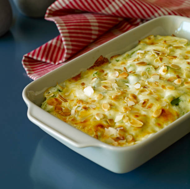 Vegetarian dish Roasted vegetarian dish with a cream and cheese sauce seafood gratin stock pictures, royalty-free photos & images