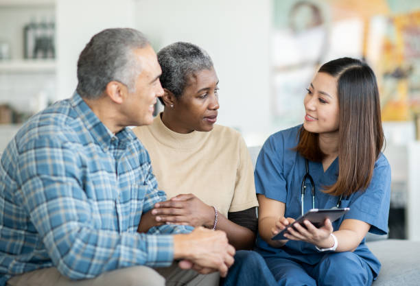 istock Senior Couples Homecare Visit 1375404463