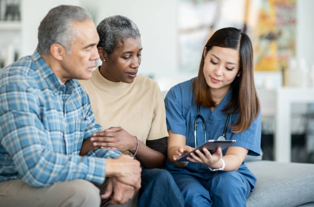 istock Senior Couples Homecare Visit 1375404465