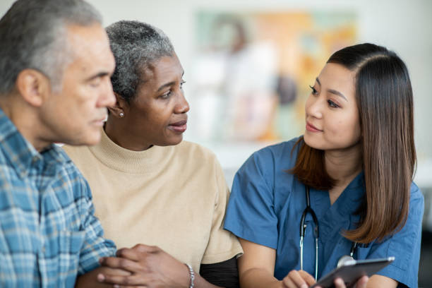 istock Senior Couples Homecare Visit 1375404474