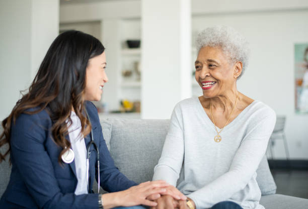 istock Homecare Visit with a Senior 1375404482