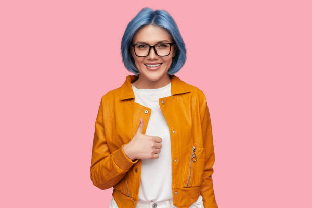 istock Stylish female gesturing thumb up 1375438819