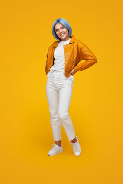istock Stylish woman with blue hair in studio 1375438841