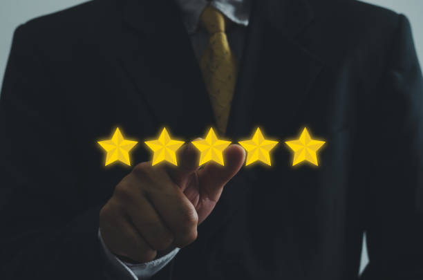 istock Customer concept excellent service for satisfaction five star rating with business man touch screen. About feedback and positive customer reviews. 1375441165