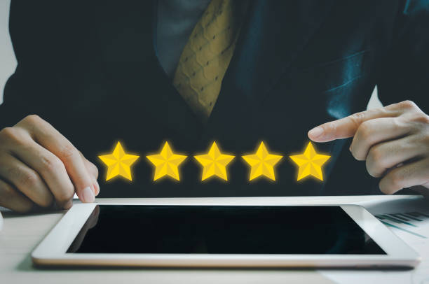 istock Customer concept excellent service for satisfaction five star rating with business man touch screen on tablet.feedback and positive customer reviews. 1375441167