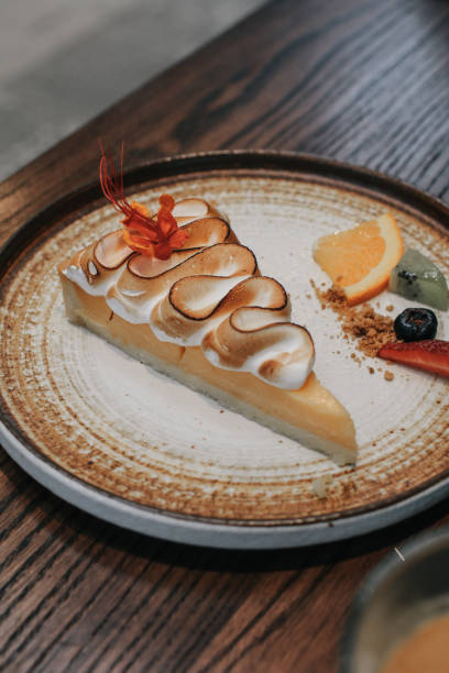 Lemon tart with meringue pie. Traditional french sweet pastry tart. Delicious, appetizing, homemade dessert with lemon curd cream.